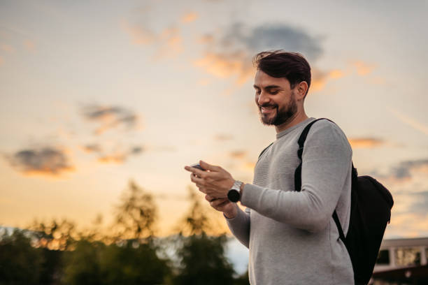 istock Man Texting On His Smartphone Outdoors 1652855901