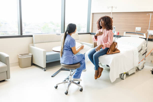 istock In ER, female nurse documents female patient's symptoms 1652856772
