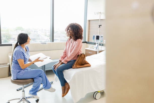 istock Female ER nurse helps patient see bright side 1652856996