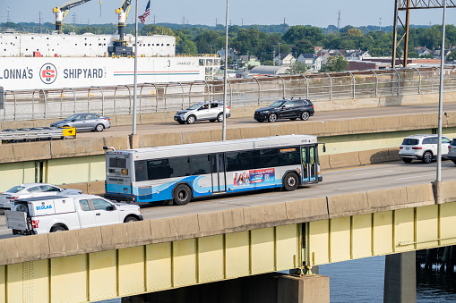 Norfolk Virginia - August 22 2023: A Hampton Roads Transit Bus Traveling over an Interstate Bridge in Norfolk Virginia