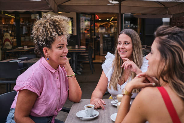 istock friends having coffee on an outdoor terrace 1652862404