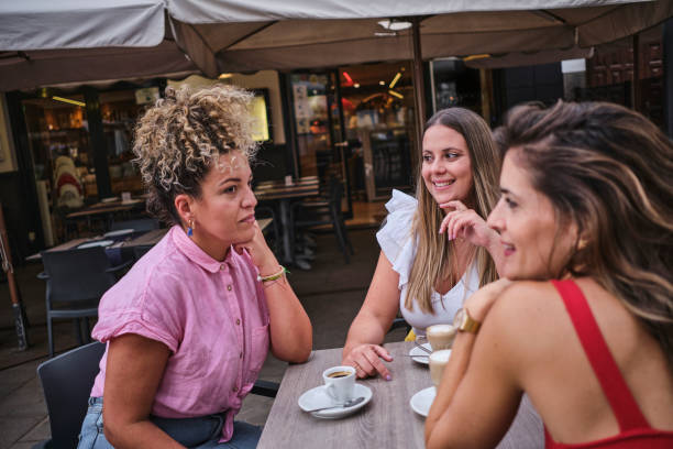 istock friends having coffee on an outdoor terrace 1652862921