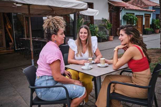 istock friends having coffee on an outdoor terrace 1652863962