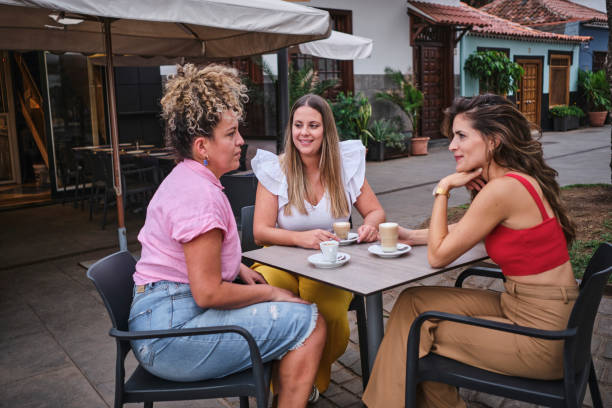 istock friends having coffee on an outdoor terrace 1652864459