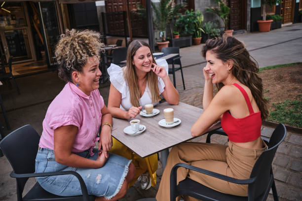 istock friends having coffee on an outdoor terrace 1652864729