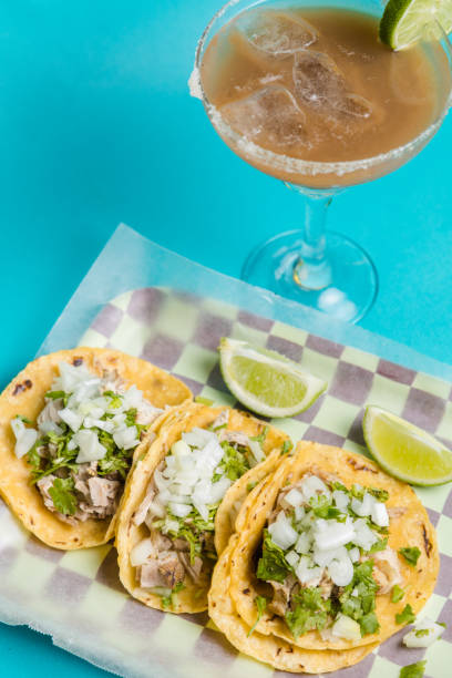 istock beef tacos with a margarita 1652902195
