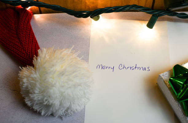 istock Christmas composition. Christmas hat, gift box, and a Christmas card 1652904845