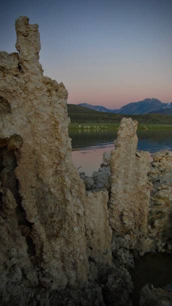 white tufa carbonate rock formations of mono lake light up at dawn. - mono county imagens e fotografias de stock