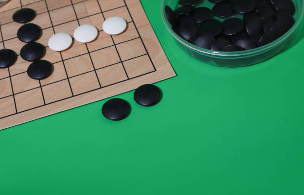 istock ancient board logical and strategic game of Go 1652921791