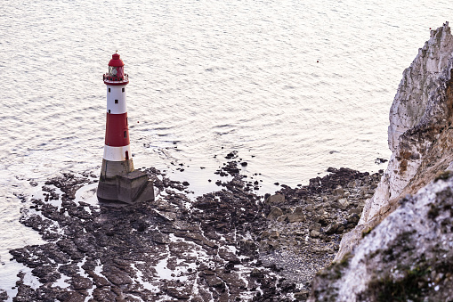 Famous place in Southern England Beachy Head lighthouse low tide sea English Channel East Sussex England Europe