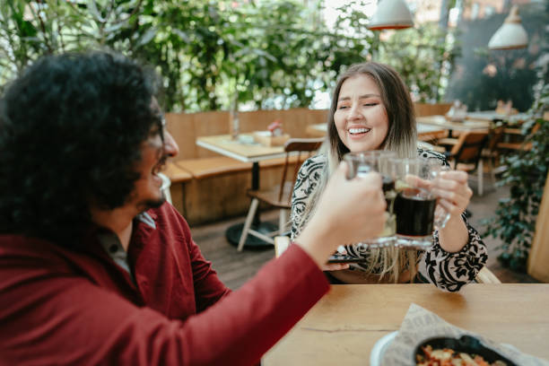 istock Friends toasting at a restaurant 1652932999