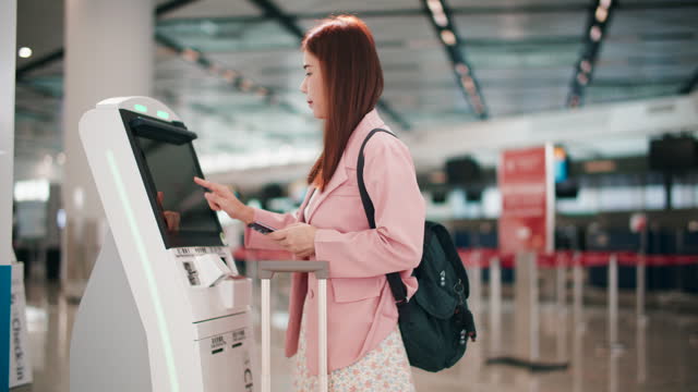 Businesswoman Self-service Check-in at the airport