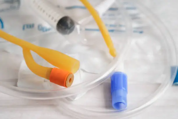 Foley catheter and urine drainage bag collect urine for disability or patient in hospital.