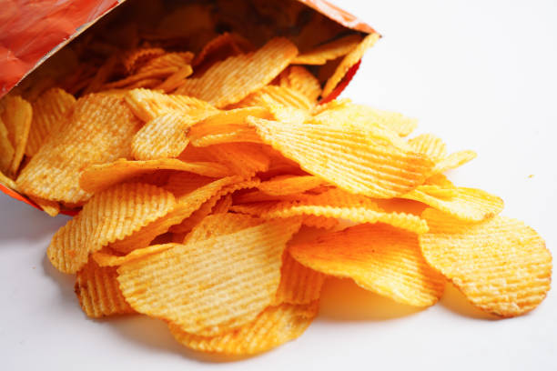 istock Potato chips in open bag, delicious BBQ seasoning spicy for crips, thin slice deep fried snack fast food. 1652958978