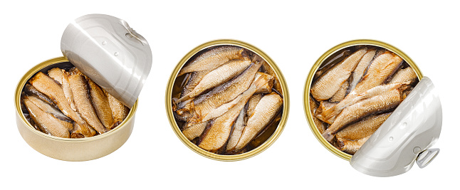 Sprats fish in oil in open round cans, \nset, isolated on white background