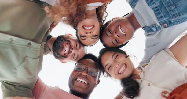 istock Diversity, teamwork and comic with business people from bottom for community, funny and support. Target, happy and solidarity with employee and funny face for collaboration, success and achievement 1653030774