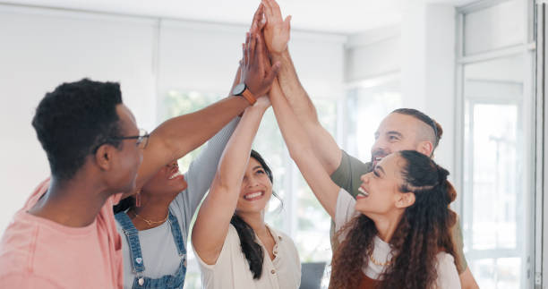 istock Teamwork, applause and business people with hands stack in office for motivation, team building or unity. Celebration, clapping and group of happy employees in huddle for goals, targets or mission. 1653030790