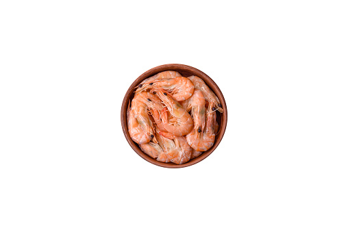 shrimp meal. Commercial shrimp species support an industry worth 50 billion dollars a year, and in 2010 the total commercial production of shrimp was nearly 7 million tonnes. Shrimp farming took off during the 1980s, particularly in China.