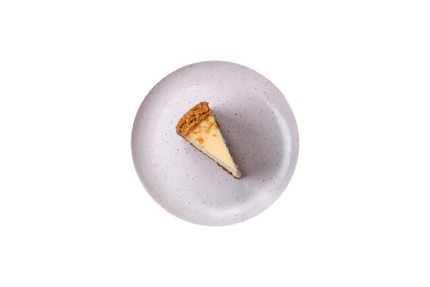 istock Delicious sweet cheesecake cake on textured concrete background 1653040244