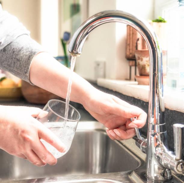 istock Filling a glass with cold water 1653063928