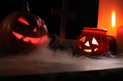 Candle-lit Halloween Pumpkins, Glowing Pumpkin , Scary Halloween pumpkin in dark background