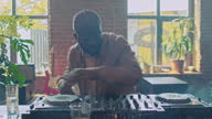 istock African American DJ Playing Music 1653089107
