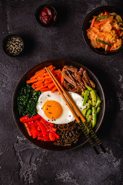 istock Traditional Korean dish Bibimbap: rice with vegetables beef and egg. 1653132763