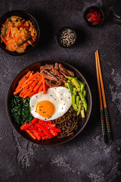 istock Traditional Korean dish Bibimbap: rice with vegetables beef and egg. 1653132764