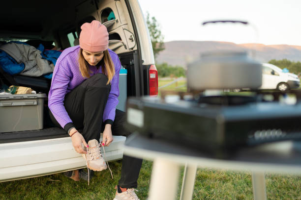 istock Camper girl preparing for hiking 1653147196