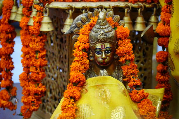 istock a lord hanuman praying golden sculpture in temple 1653155281