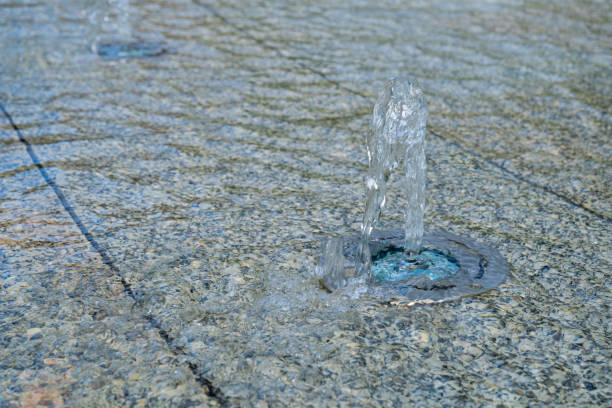istock Fountain Water Texture Background, Falling Fresh Fountain Jets, Waterfall Splash Pattern, Summer Park 1653155303