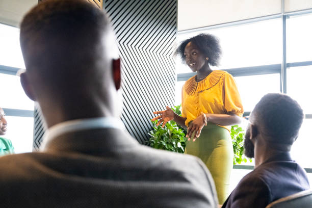 istock Team leader discussing plans with business associates 1653159666