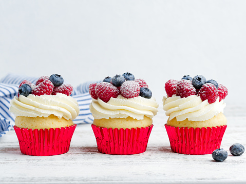 Festive bakery, christmas or celebration dessert. Red, blue and white colours.