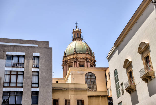 Palermo, Italy - July 18, 2022: Classic architecture and building facades on the streets in Palermo