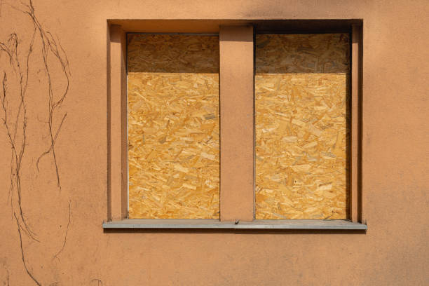 istock Abandoned Building with Boarded Up Windows, Old House Texture Background, Dilapidated Property 1653367062