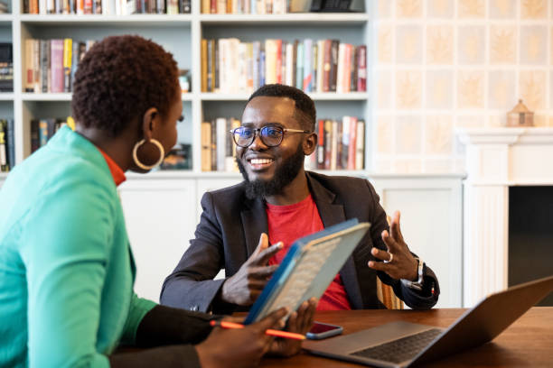 istock Business associates engaged in friendly debate 1653368717