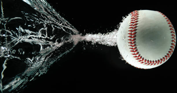 istock Baseball's Ball Falling into Water against White background 1653388981