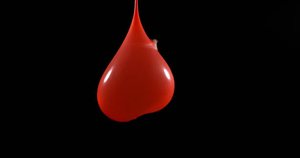 istock Shot Breaking Water Filled Red Balloon 1653394373