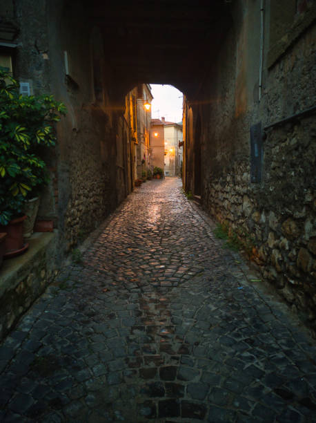 istock ancient narrow streets of Italy 1653396042
