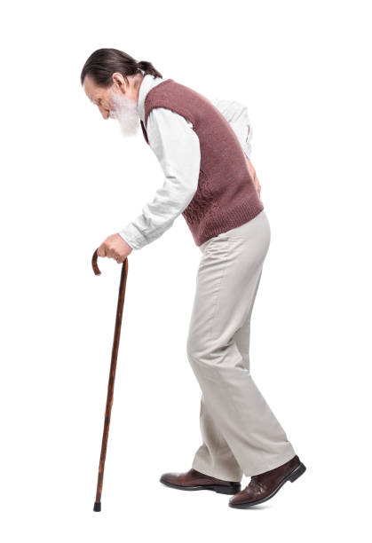 istock Senior man with walking cane on white background 1653451760