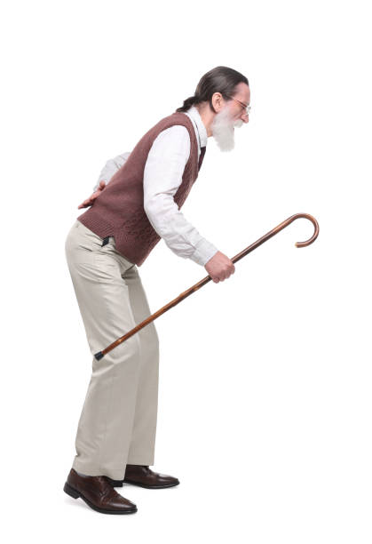 istock Senior man with walking cane on white background 1653456656