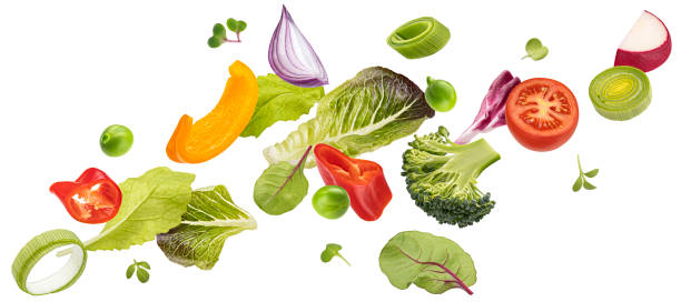 istock Falling vegetables, salad of bell pepper, tomato and lettuce leaves 1653559663