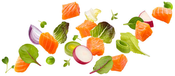 istock Falling salmon salad ingredients isolated on white background 1653561321