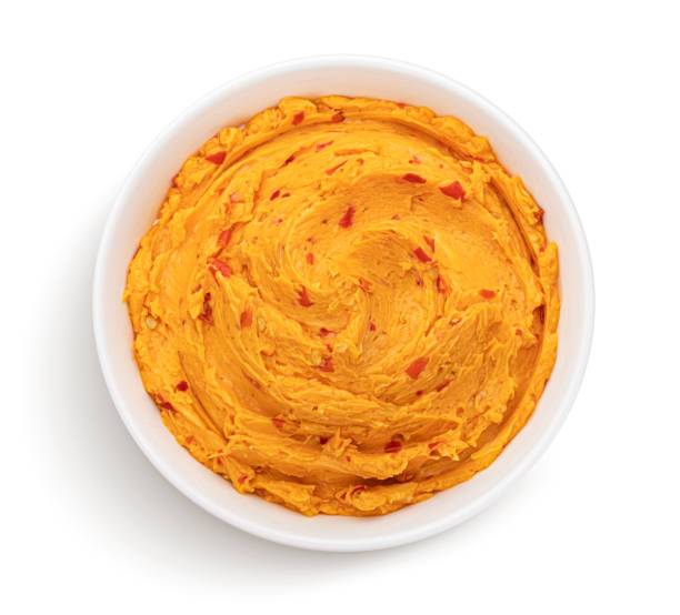istock Spicy chili pepper butter isolated on white background, top view 1653564492