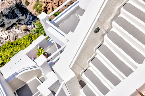 Fira, Greece - July 20, 2023: Walkways and staircases in the town of Fira on the island of Santorini in Greece