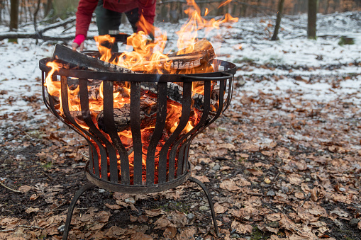 fire bowl in the wintry forest