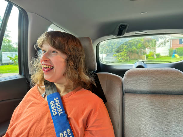 istock Young disabled woman is excited to run errands with her caretaker 1653775465