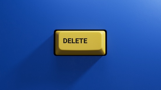 Delete.3D illustration of button of keyboard of a modern computer.Light yellow button.3D rendering on blue background.