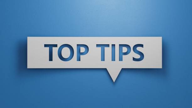 istock Top Tips - Speech Bubble. Minimalist Abstract Design. White Cut Out Paper on Blue Background. Business Concept. 3D Render. 1653841080