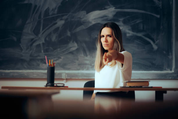 Angry Teacher Pointing to the Classroom During Scolding Students